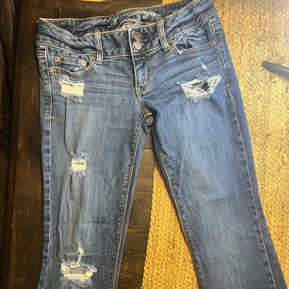 American Eagle “Artist” Flare distressed Stretch Jean Size 4